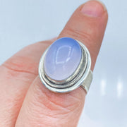 Oval Blue Chalcedony Brushed Sterling Silver Ring on Finger