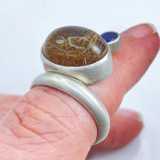Golden Rutilated Quartz Iolite Sterling Silver Floating Ring on Finger Closeup