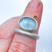 Aquamarine Tourmaline Sterling Silver Floating Ring Closeup on finger