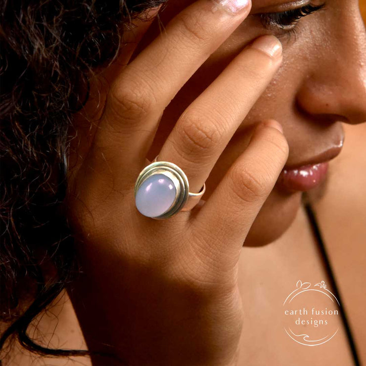 Oval Blue Chalcedony Brushed Sterling Silver Ring on Model's Finger