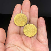 Brass Radial Textured Disc Drop Earrings size comparison to hand