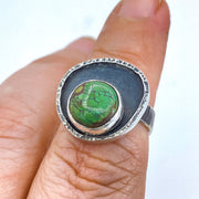 Hubei Turquoise Sterling Silver Modern Warped Circle Ring on Finger Closeup