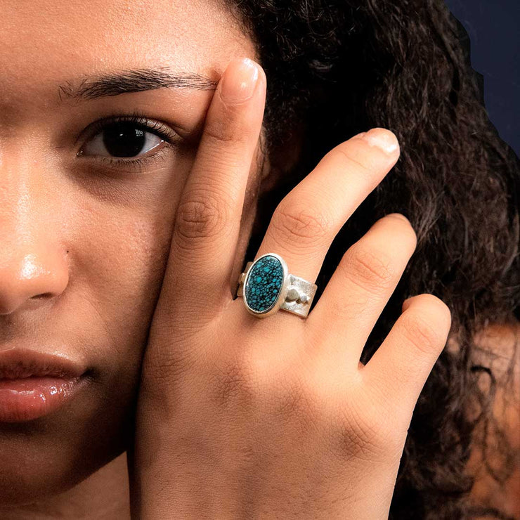 Oval Blue Hubei Turquoise Sterling Silver Six Pebbles Ring on Model's Finger