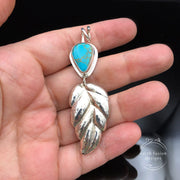 Kings Manassa Turquoise and Sterling Silver Repoussé Leaf Pendant Size Comparison to Hand