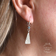 London Blue Topaz Sterling Silver Triangle Drop Earrings on model