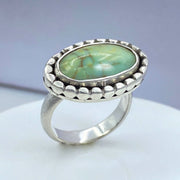 Nevada Silver Peak Variscite Halo Ring on Model's Hand