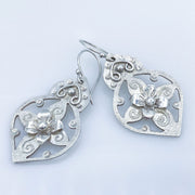 Pierced Floral Arabesque Sterling Silver Earrings closeup of texture