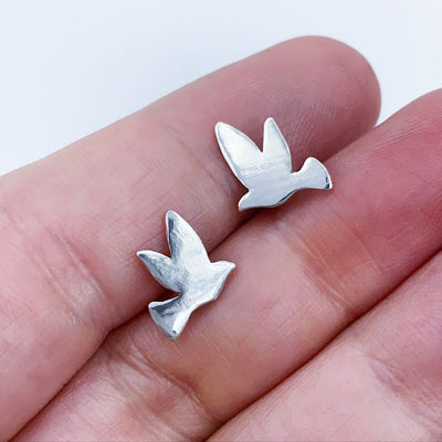 Sterling Silver Bird Post Earrings size comparison to hand