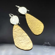 Textured Sterling Silver and Hammered Brass Abstract Earrings Alternate view of them laying flat