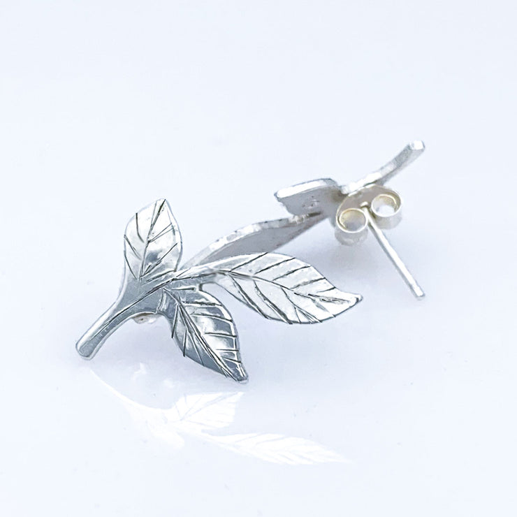 Sterling Silver Three Leaf Ear Climber Post Earrings Size Comparison to hand showing earring back