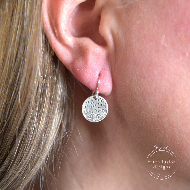 Sterling Silver Lotus Flower Stamped Disc Earrings on Model