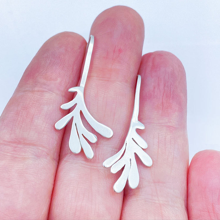 Sterling Silver Modern Leaf Threader Earrings size comparison to hand
