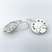 Sterling Silver Moroccan Stamped Disc Earrings closeup of ear wire