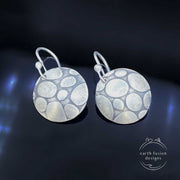 Sterling Silver Pebble Textured Disc Drop Earrings Laying Flat