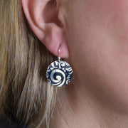 Sterling Silver Swirl Textured Domed Medallion Earrings on Model