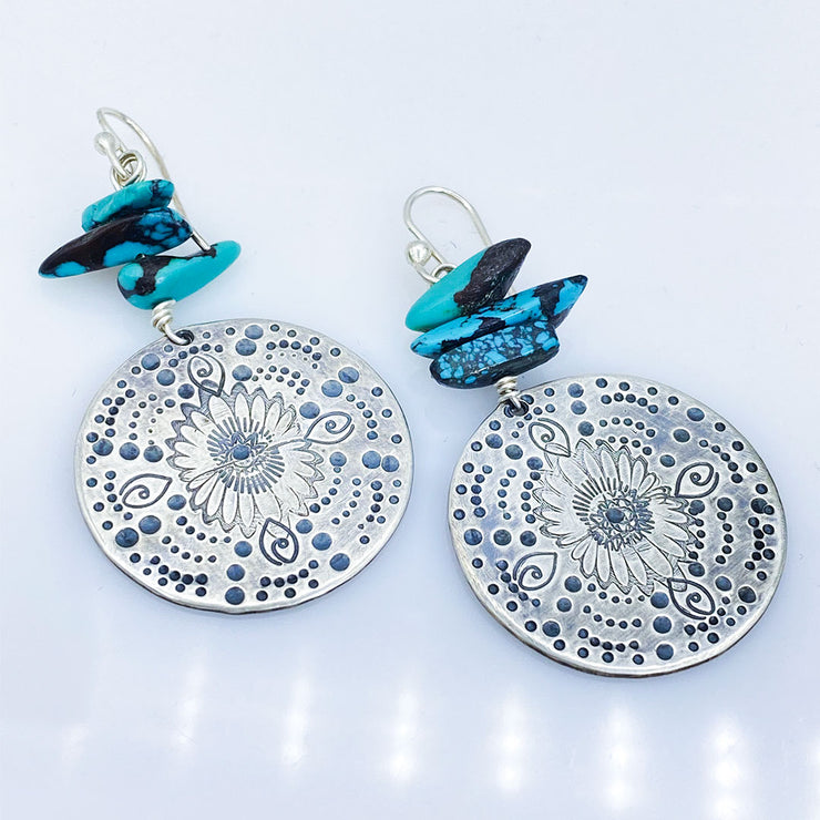 Turquoise Beaded Sterling Silver Stamped Medallion Earrings Laying Flat diagonal