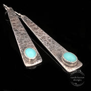 Turquoise Sterling Silver Triangle Earrings laying flat