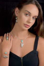 Royston Turquoise and Sterling Silver Repoussé Adjustable Leaf Bracelet on Model