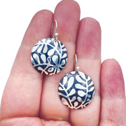 Sterling Silver Modern Vine Textured Domed Medallion Earrings size comparison to hand